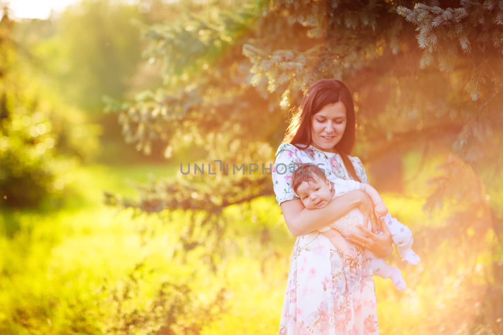 Mother with baby son, close-up, summer by natalialeb