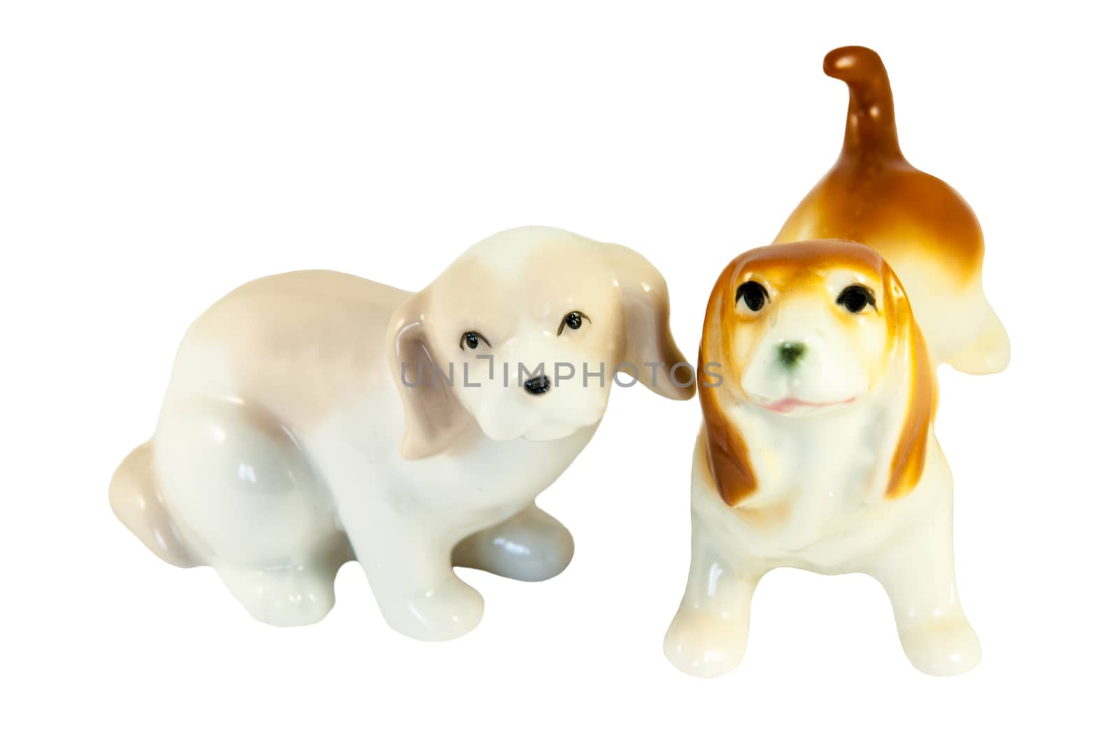 Statuettes Ceramic dogs isolated on white background