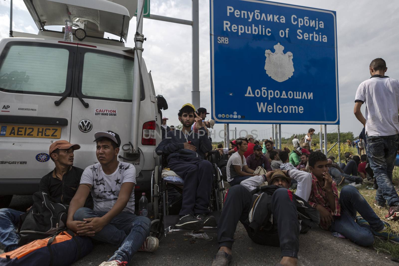 SERBIA, Horgos: Refugees wait at the Serbia-Hungary border, blocking traffic, after Hungary closed the border crossing on September 16, 2015.****Restriction: Photo is not to be sold in Russia or Asia****