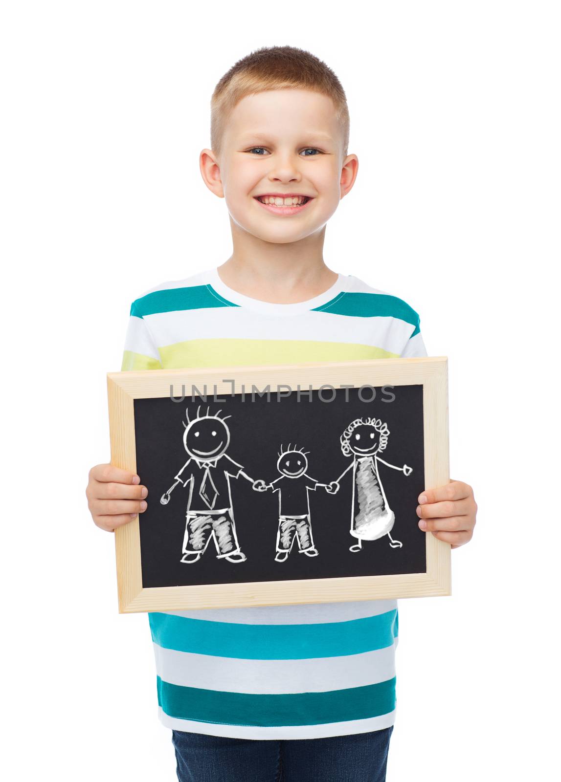 smiling little boy holding chalkboard with family by dolgachov