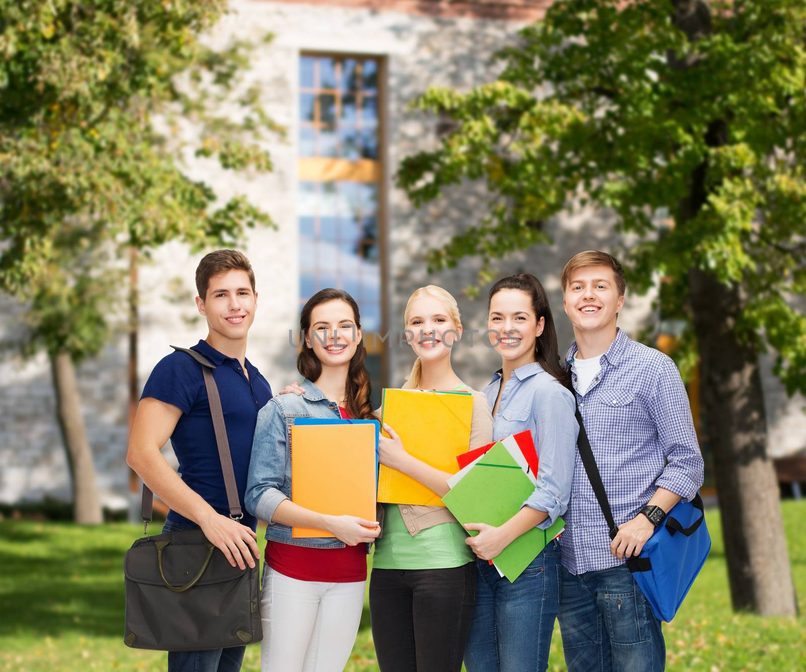 group of smiling students standing by dolgachov