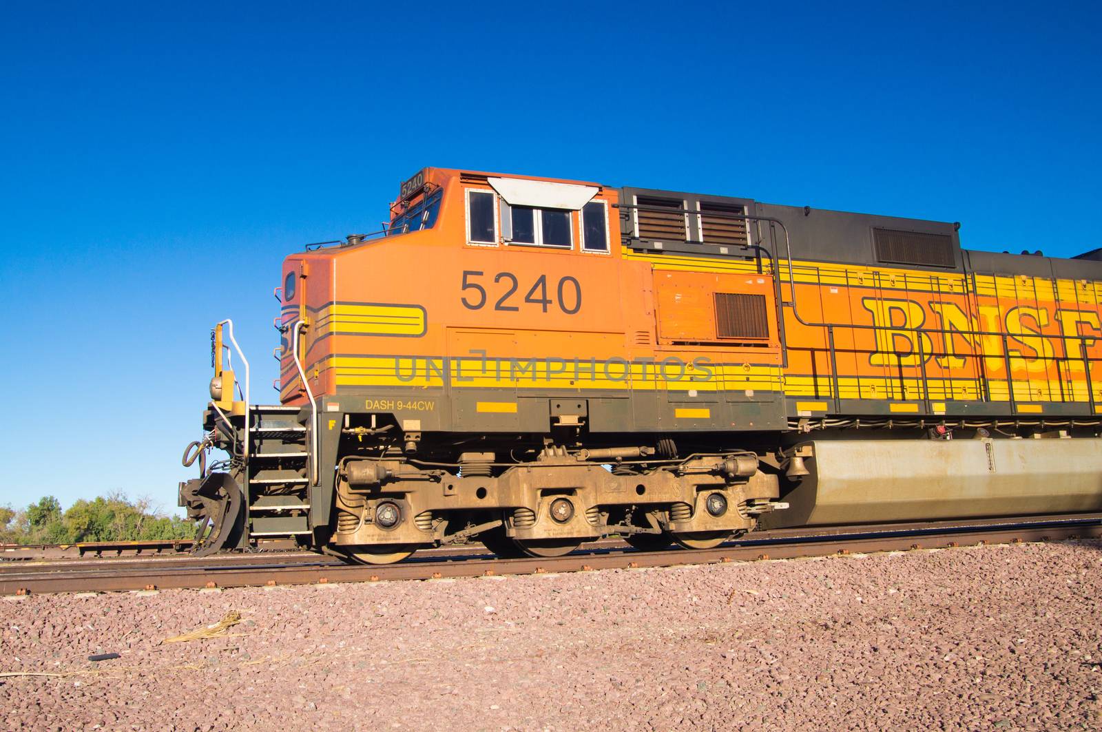 Stationary BNSF Freight Train Locomotive No. 5240 in the desert by emattil
