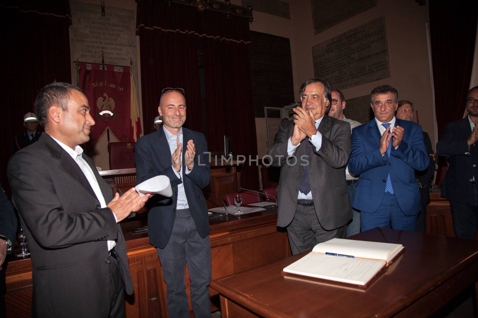 ITALY, Palermo: Doctors Without Borders cultural mediator Ahmad Al Rousan receives an honorary citizenship from Palermo Mayor Leoluca Orlando on September 16, 2015. 