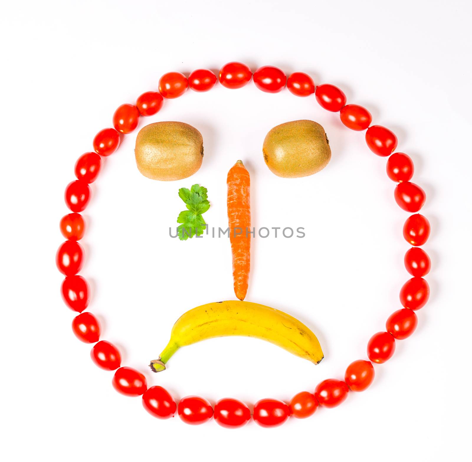 This cry smiley is made wirh carrot,kiwi,cherry tomatoes and banana