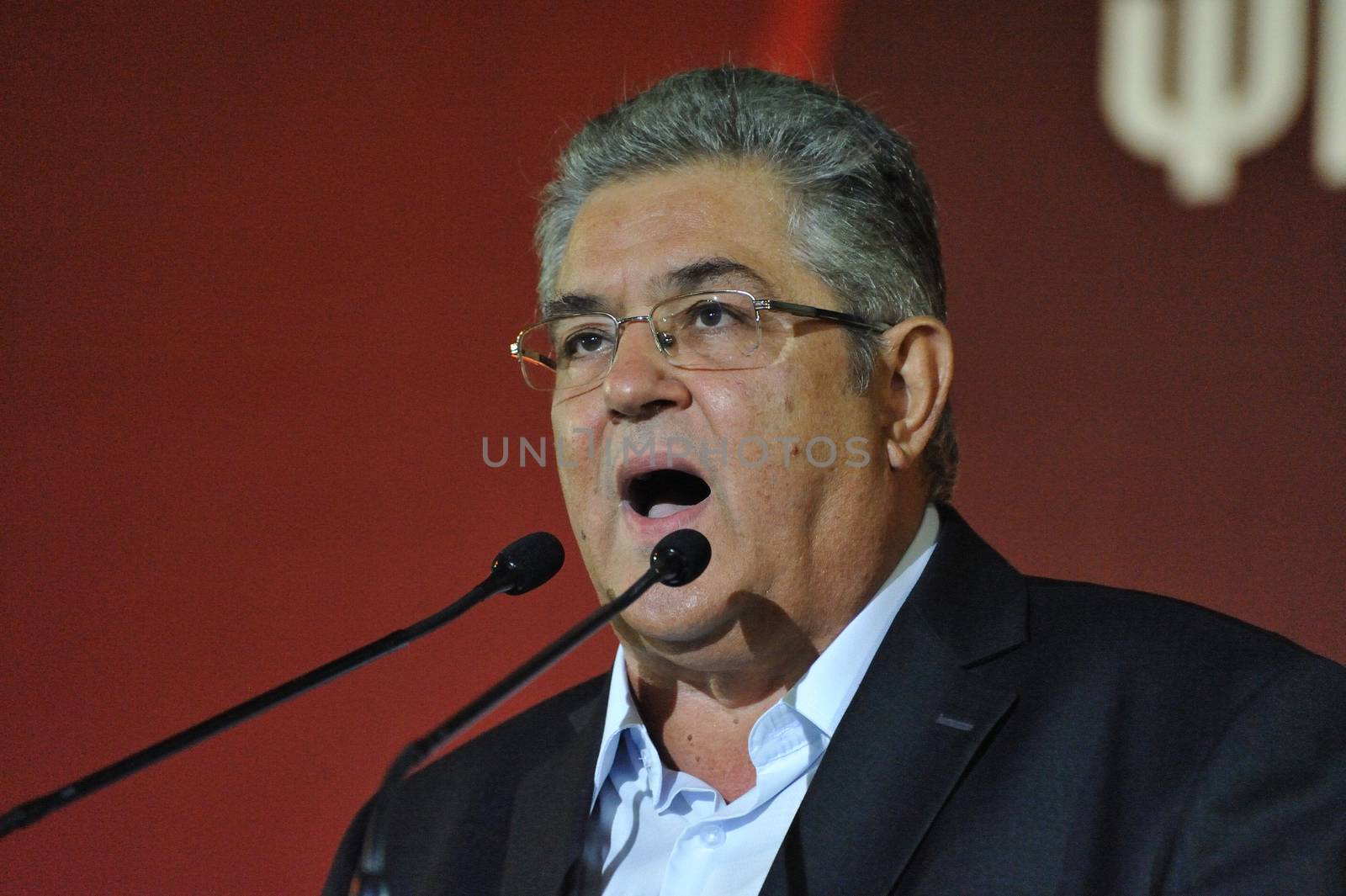 GREECE, Athens: General Secretary Dimitris Koutsoumpas of the Communist Party of Greece (KKE) speaks at a campaign rally in Athens on September 16, 2015, ahead of the forthcoming snap elections on September 20.