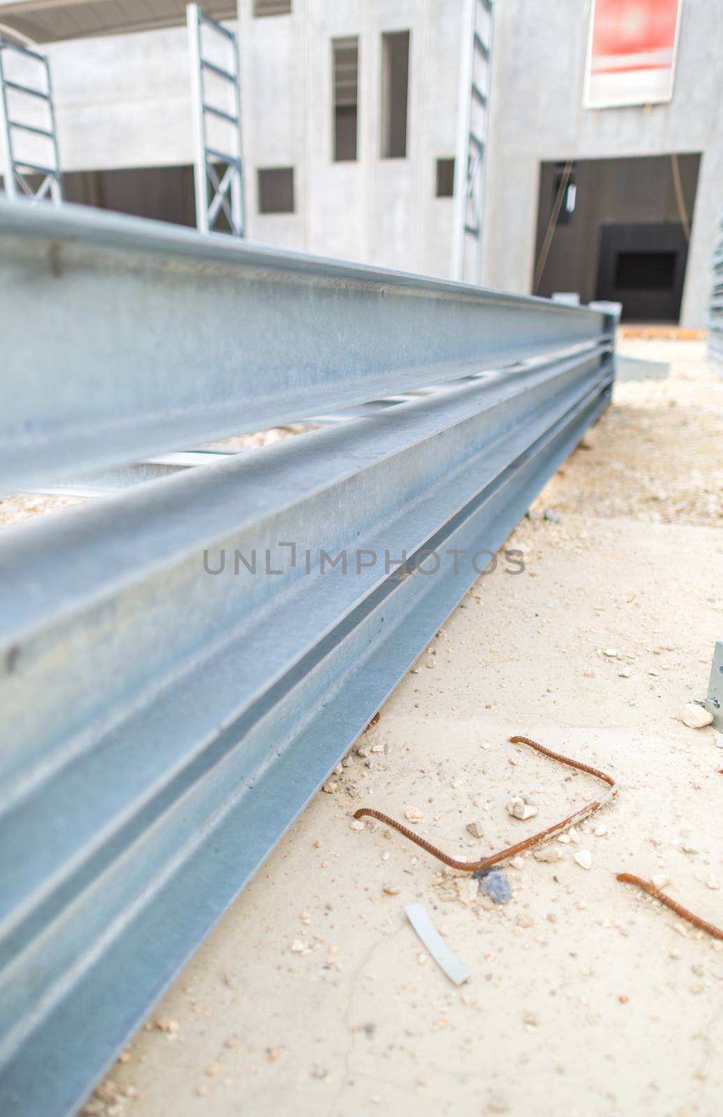 Steel girders in outdoor warehouse by jovannig