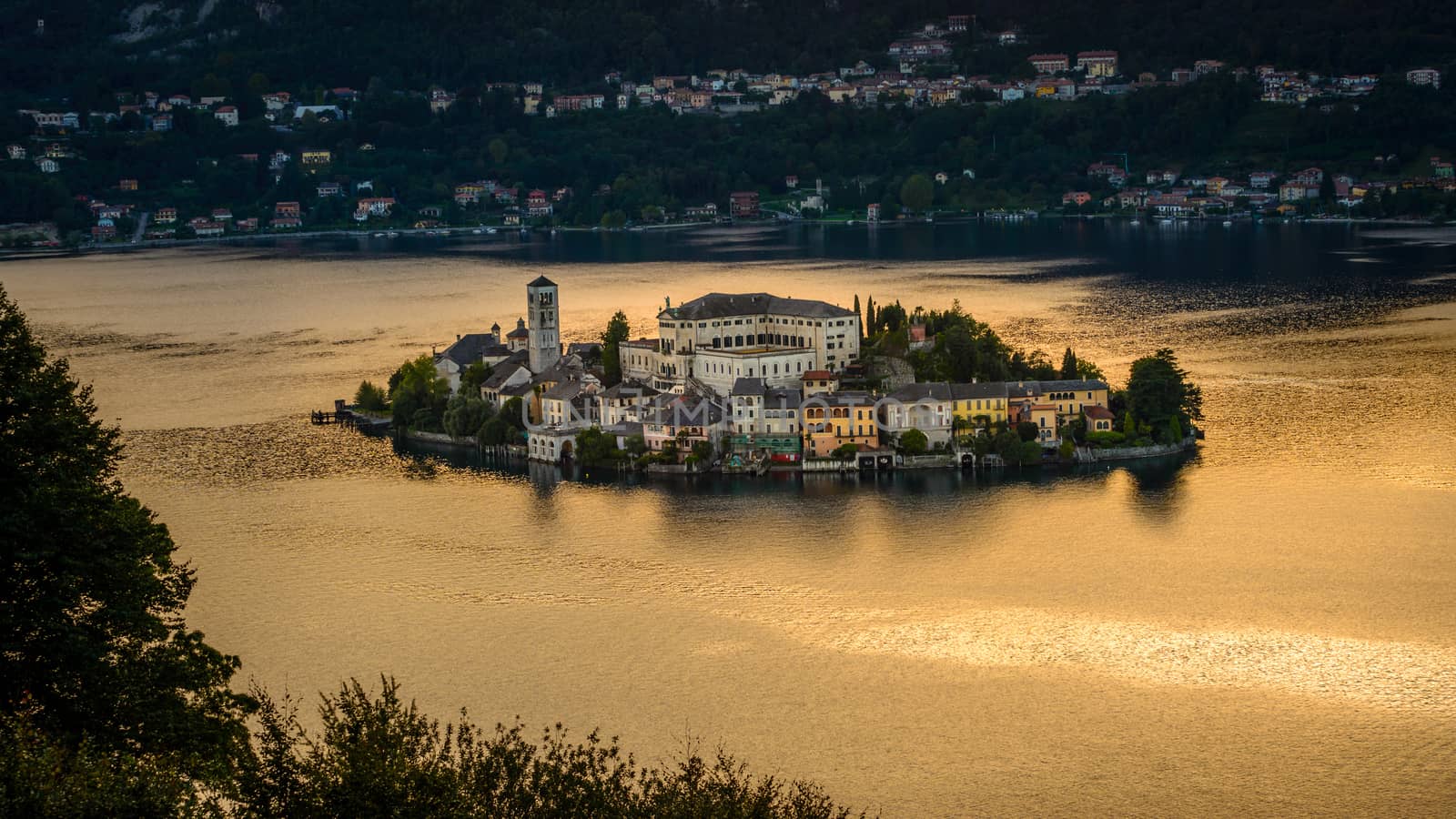 Lake Orta is known as the most romantic lake in Italy. 
located in Piedmont in northern Italy a few miles away from the largest and most famous lake Maggiore. 
In the middle of the lake there is the beautiful island of San Giulio.