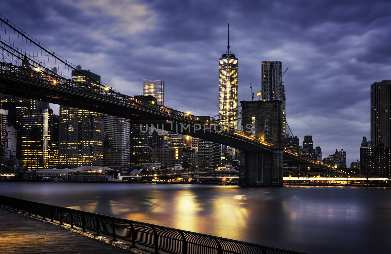 New York City - beautiful sunrise over manhattan with manhattan and brooklyn bridge USA