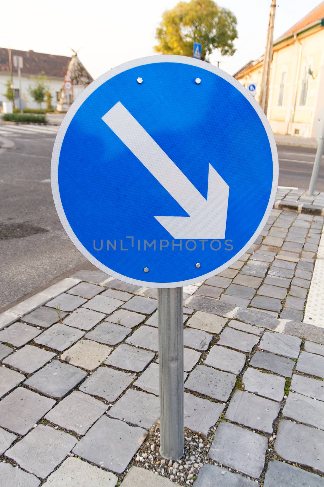 Photo of a road sign avoidance right direction