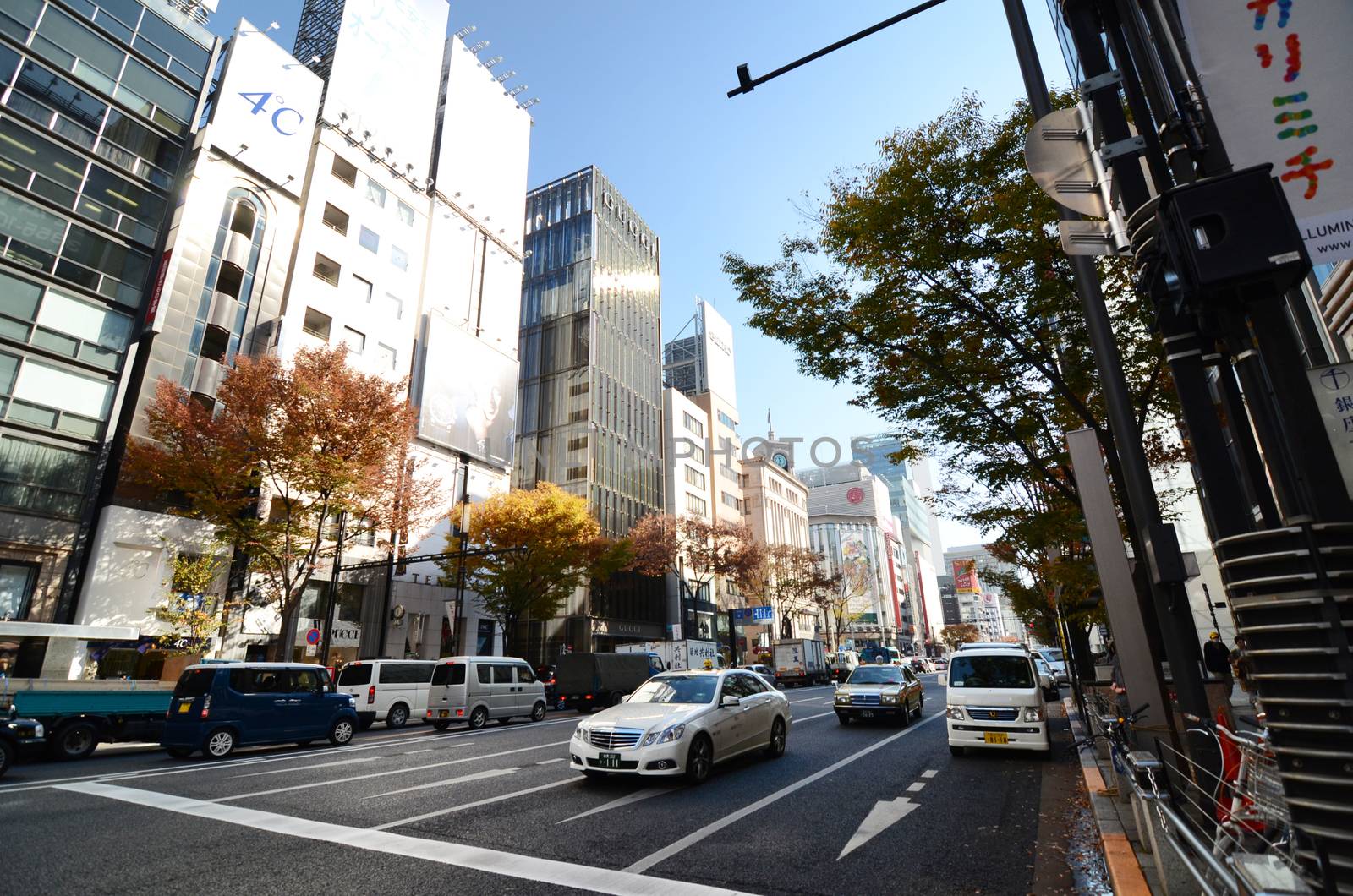 Tokyo, Japan - November 26, 2013: People shopping at Ginza area  by siraanamwong