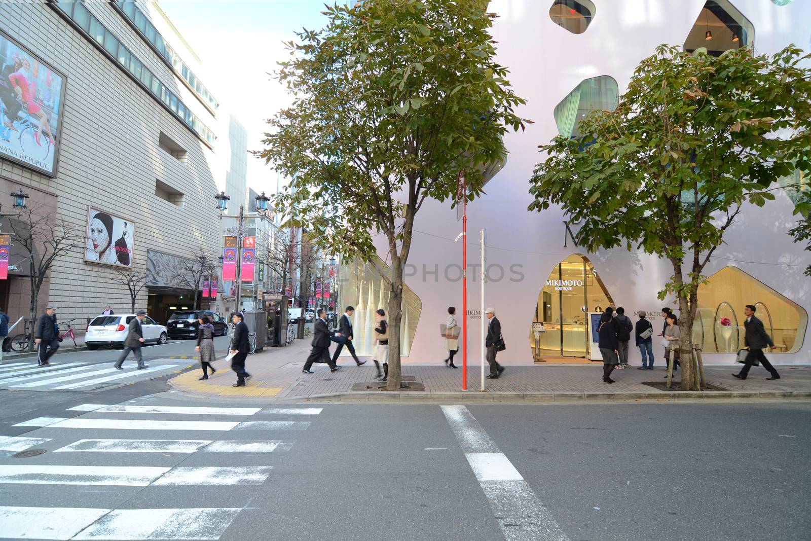 Tokyo, Japan - November 26, 2013: People shopping at Ginza area on November 26, 2013 in Tokyo. Ginza shopping area. The popular tourist spot in Tokyo. 