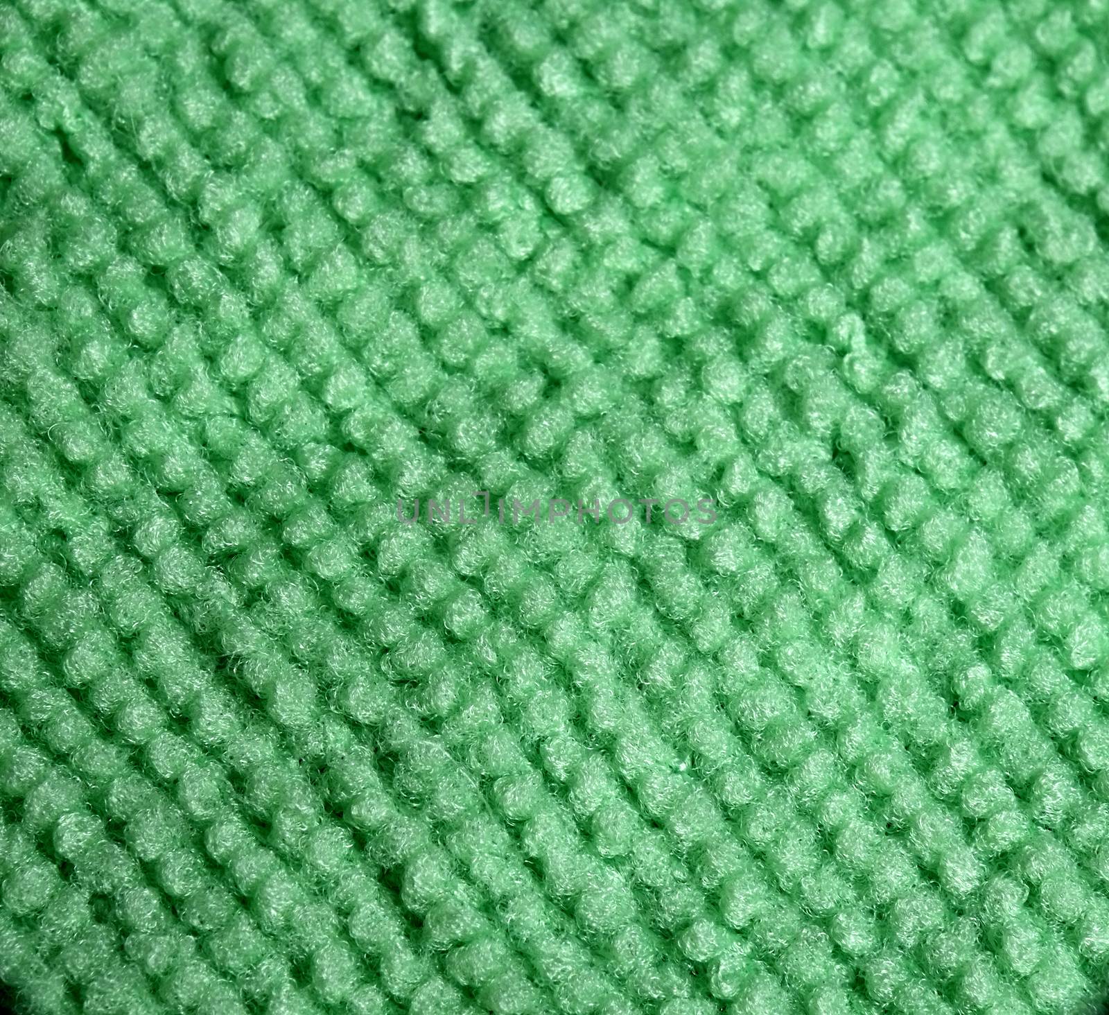 Green microfiber cloth close-up by AngeloDeVal