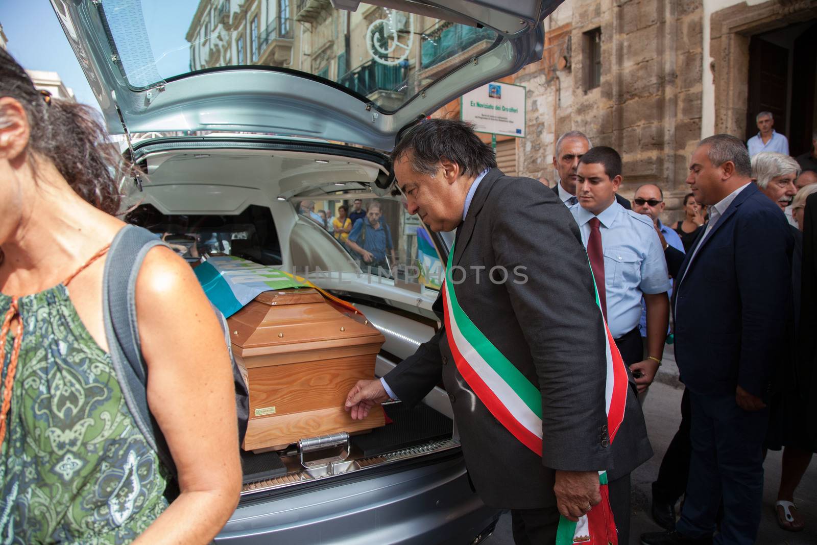 ITALY, Palermo: 	The funeral of Giovanni Lo Porto was held on September 18, 2015, with Mayor Leoluca�Orlando declaring a day of mourning in the city.  	Lo Porto, an aid worker, was being held captive by al-Qaida along with American Warren Weinstein.  	The pair were mistakenly killed during a U.S. drone strike in January. 