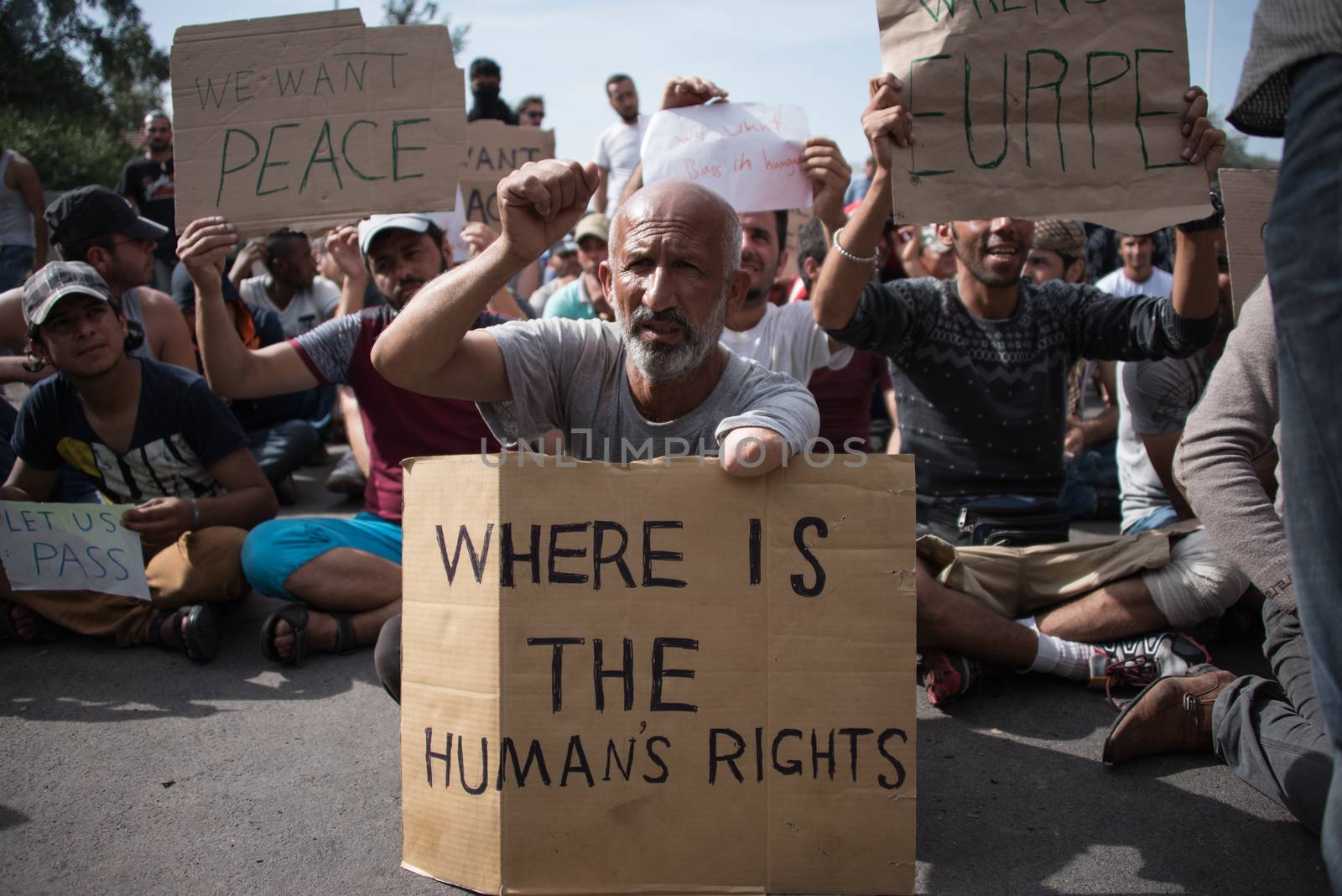 SERBIA, Horgos: Refugees, who wait to cross the border, have set their camp in the Serbian border town of Horgos on September 16, 2015.  