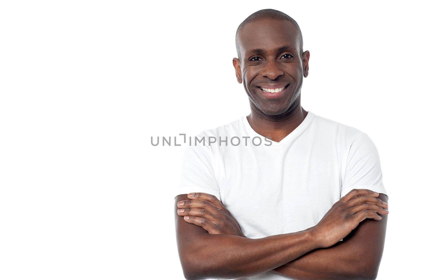 Confident middle aged man with crossed arms