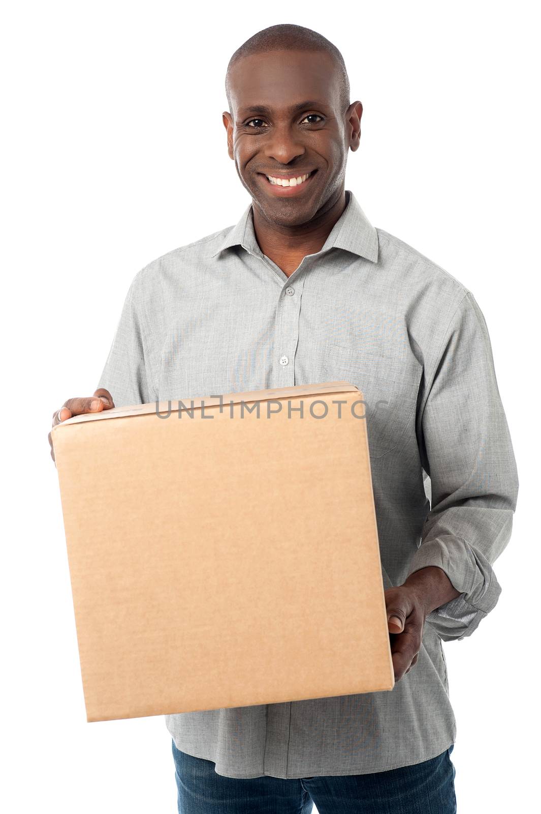 Smiling casual man carrying carton box