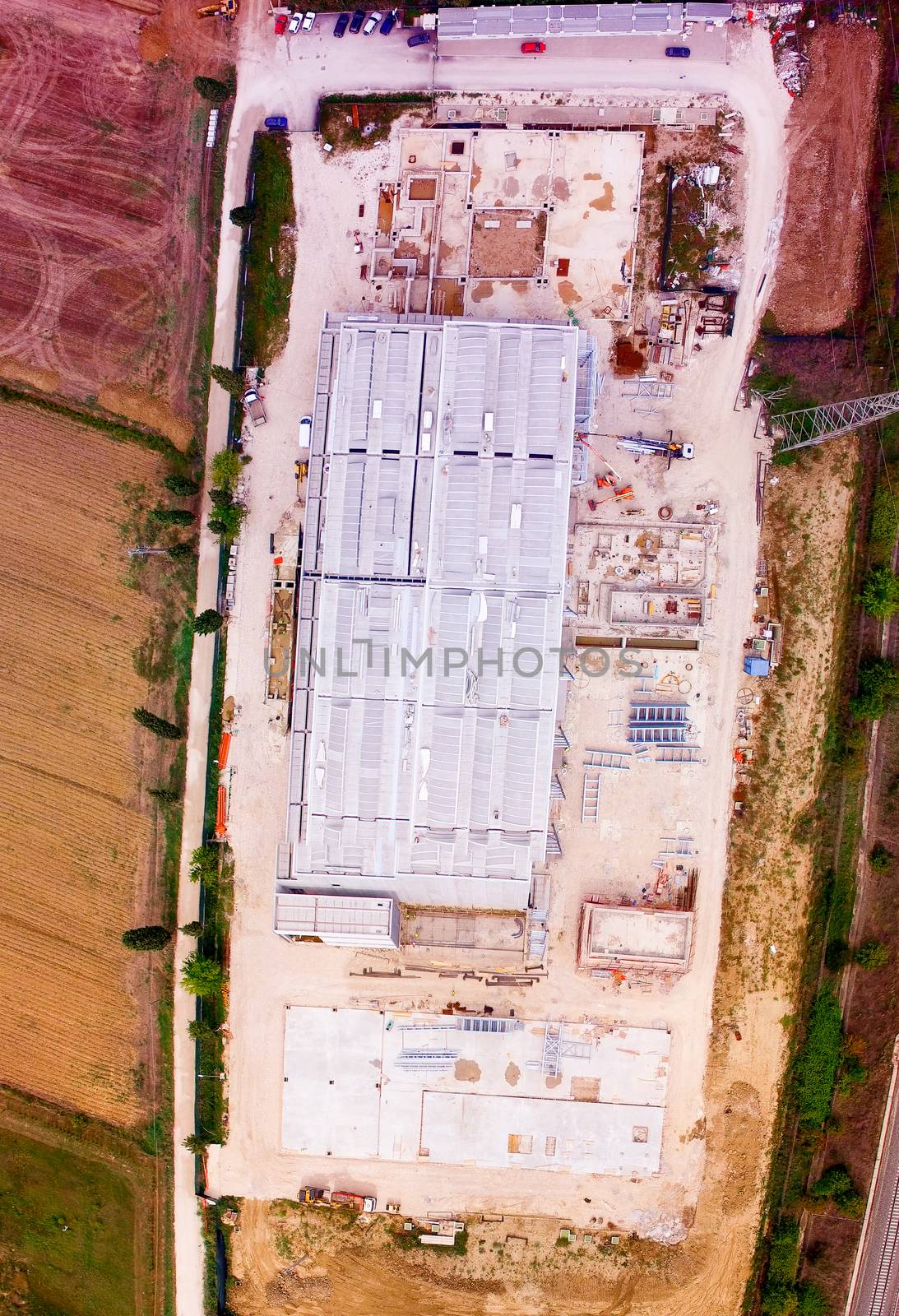 Aerial view of building construction site. Industrial environmen by jovannig