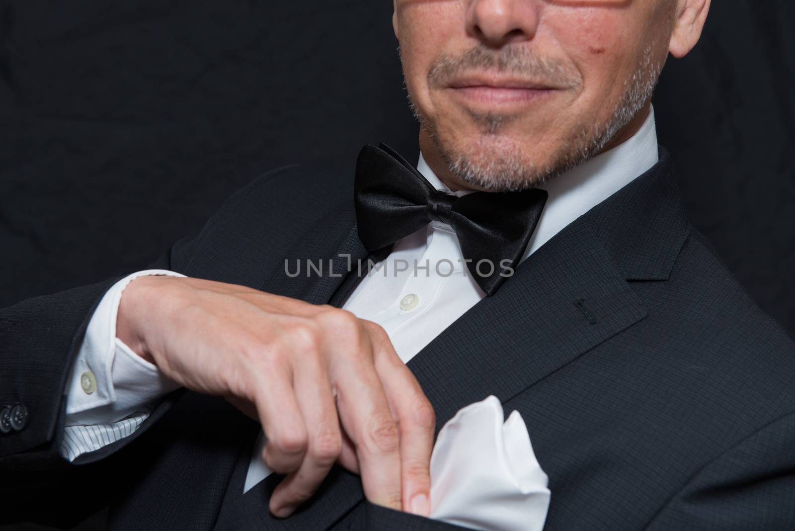 Gentleman In Black Tie Fixes Pocket Square, Horizontal by jackethead