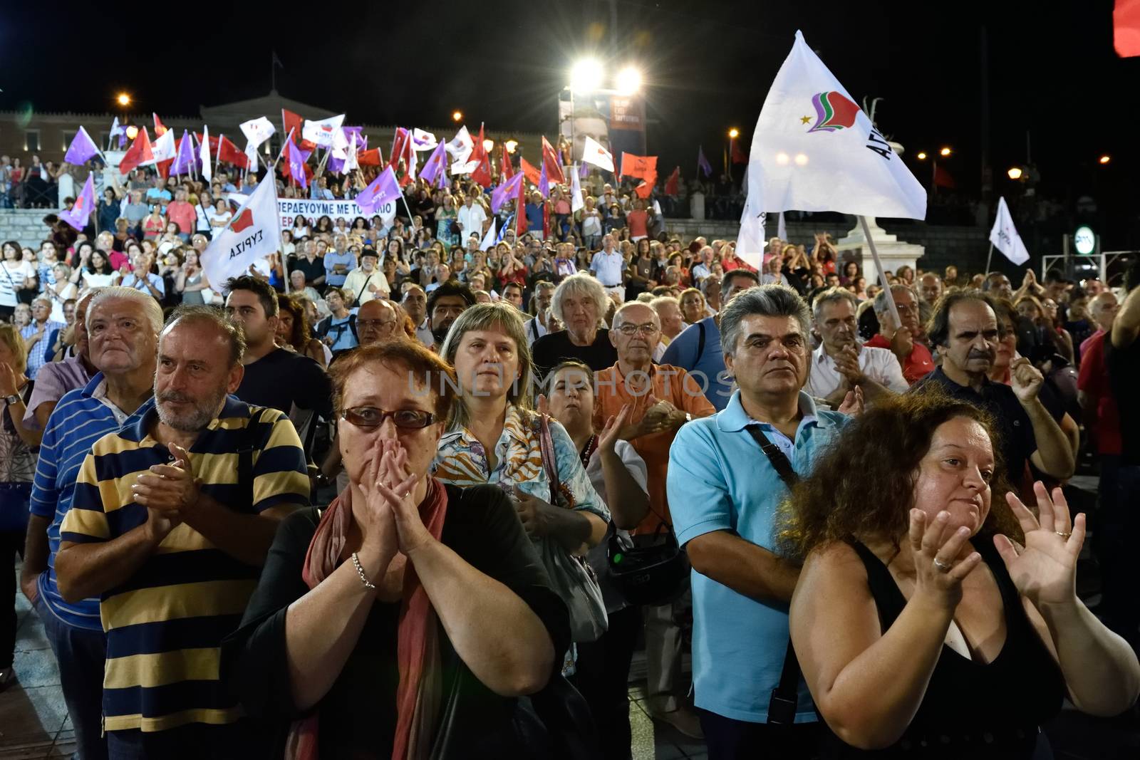 GREECE, Athens: Supporters of the Syriza party applaud during the party's main election campaign rally in Athens, Greece on September 18, 2015. The Greek General Election will be held on September 20