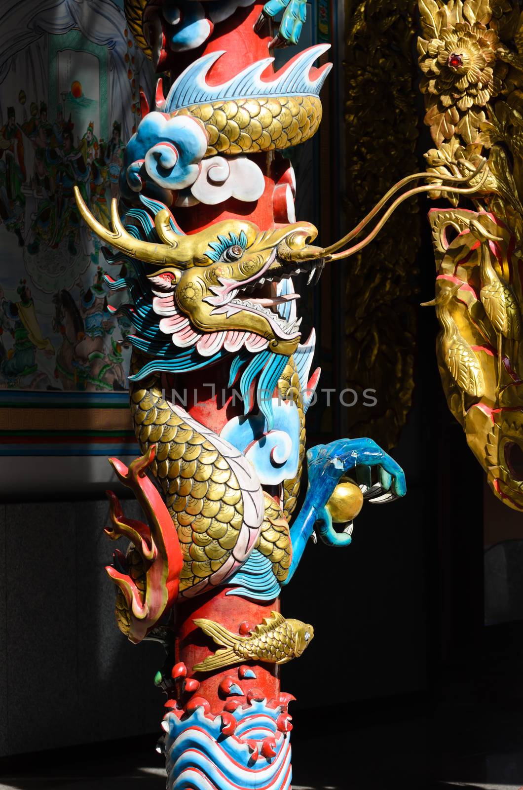 China Dragon statue in china temple roof shot  the beautiful reflected light.