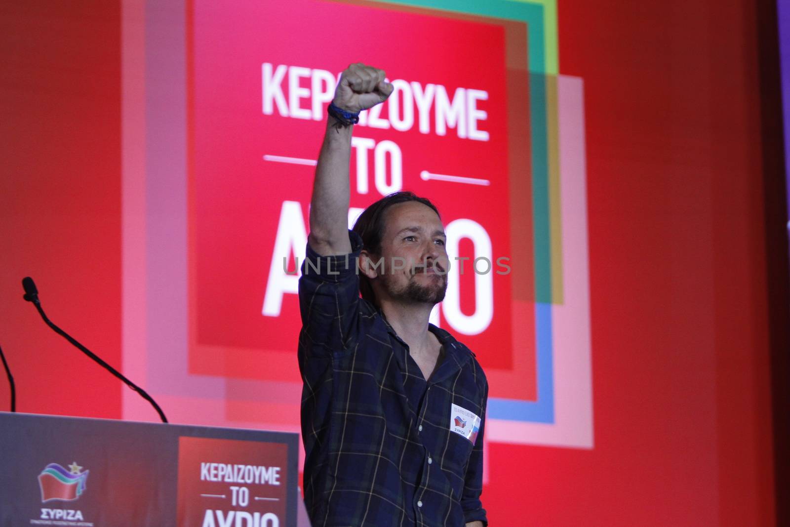 GREECE, Athens: Pablo Iglesias, the leader of the Spanish anti-austerity Podemos party, makes a clenched fist salute to Syriza supporters during the party's final election rally at Syntagma Square, Athens on September 18, 2015 two days ahead of the Greek General Election