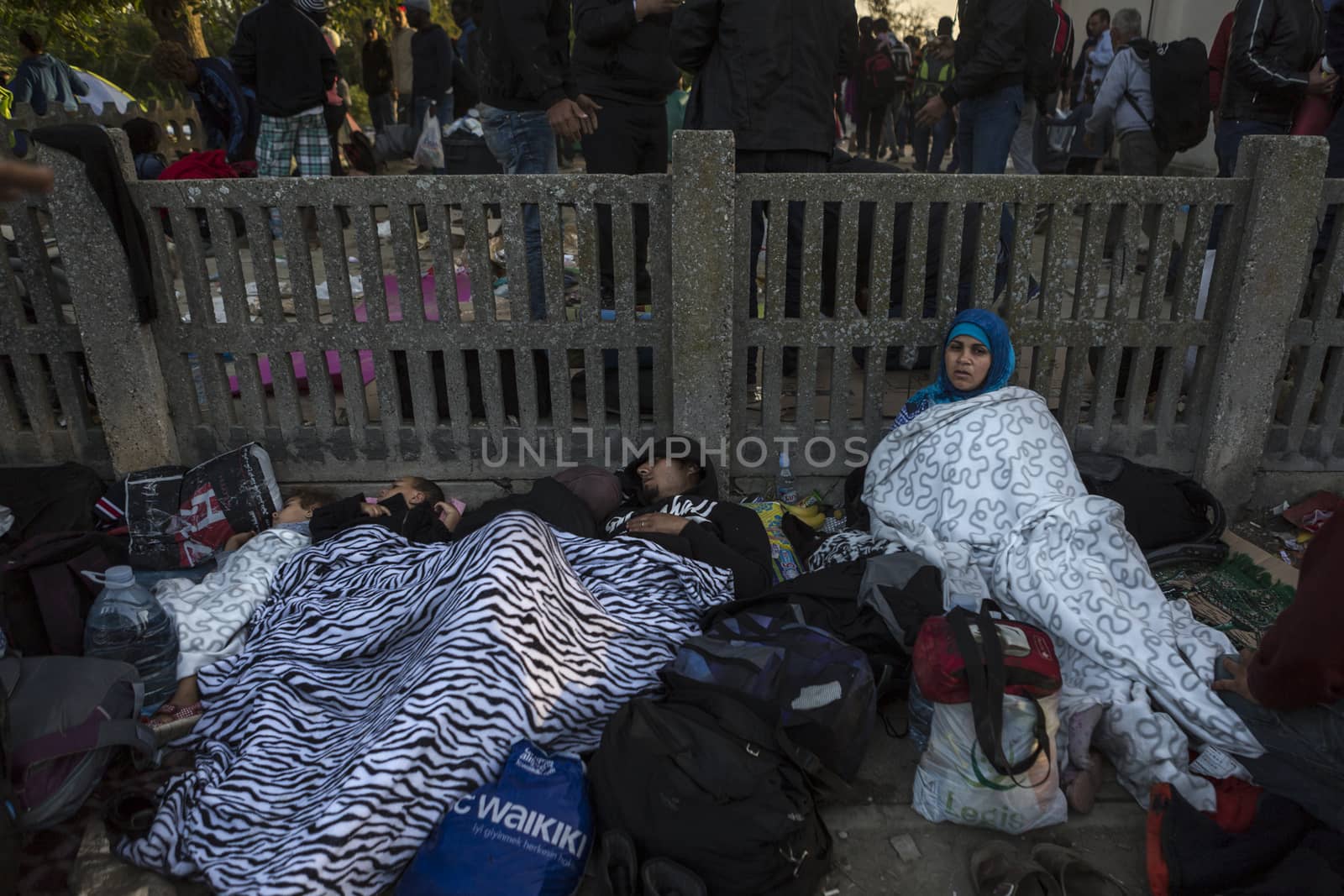 CROATIA, Tovarnik: Refugees rest at the railway station in Tovarnik, Croatia near the Serbian-border on September 18, 2015. Refugees are hoping to continue their journey to Germany and Northern Europe via Slovenia 