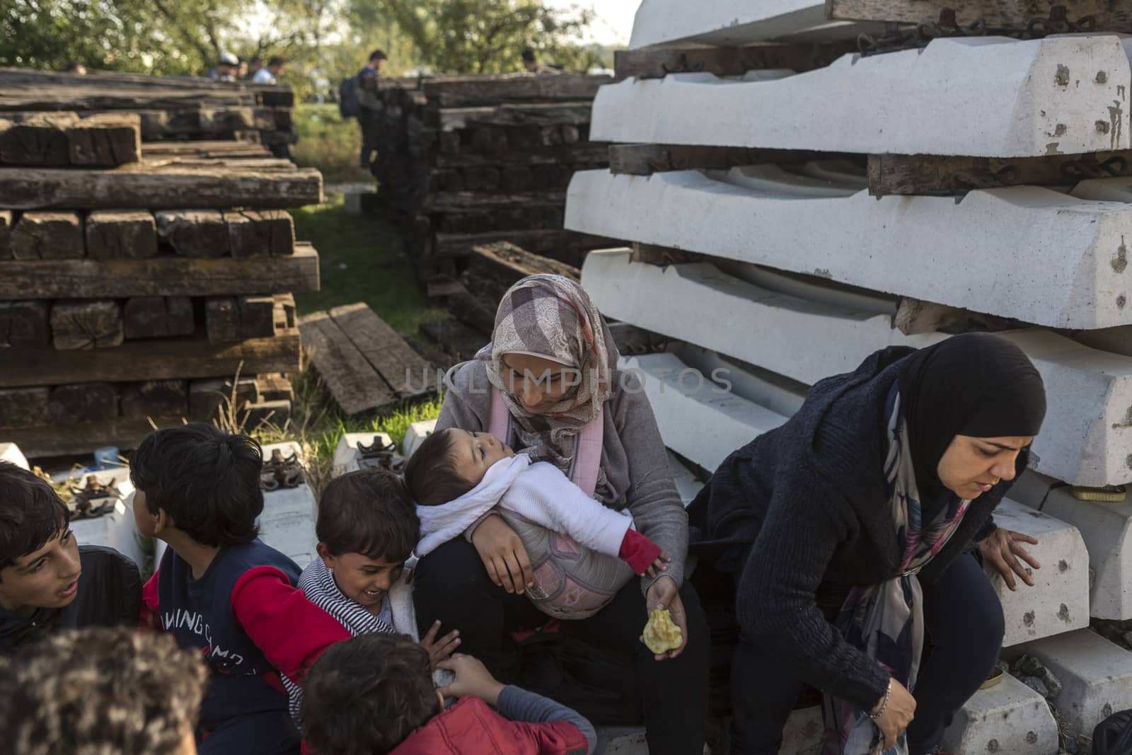 CROATIA, Tovarnik: Refugees sit and wait at the railway station in Tovarnik, Croatia near the Serbian-border on September 18, 2015. Refugees are hoping to continue their journey to Germany and Northern Europe via Slovenia 