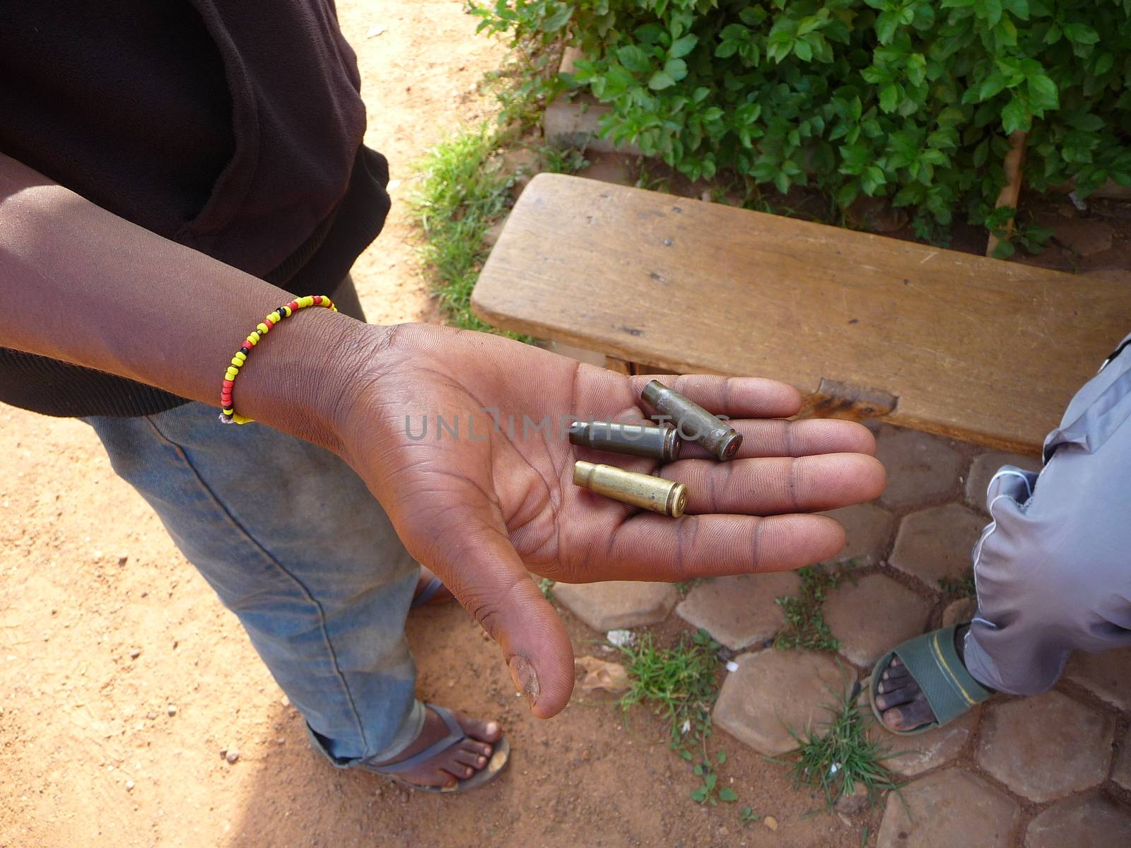 BURKINA FASO, Ouagadougou : A man shows cartridge cases in Ouagadougou, Burkina Faso, on September 18, 2015. Protests have sparked in Ouagadougou after Presidential guard officers seized power in a coup.