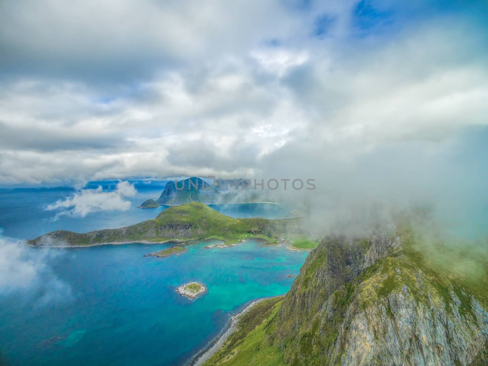 Breathtaking aerial view of clouds above Lofoten islands in Norway