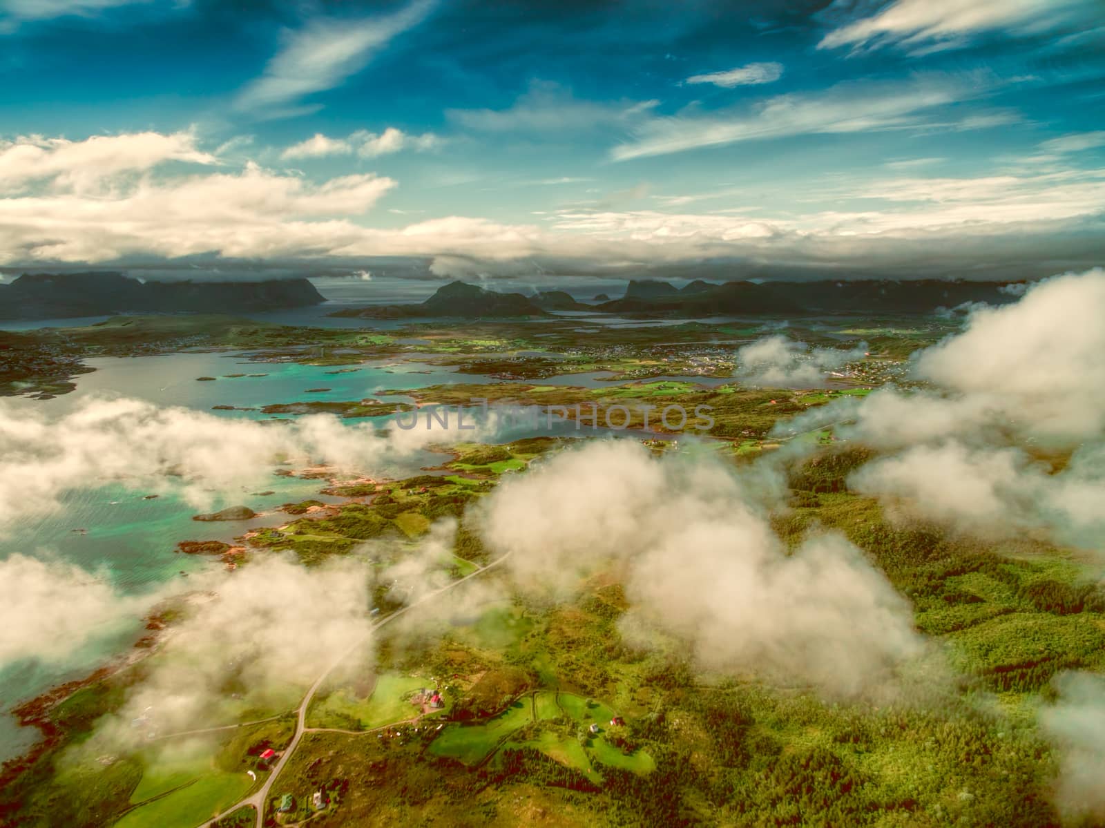 Aerial view of beautiful Lofoten islands in Norway from above the clouds