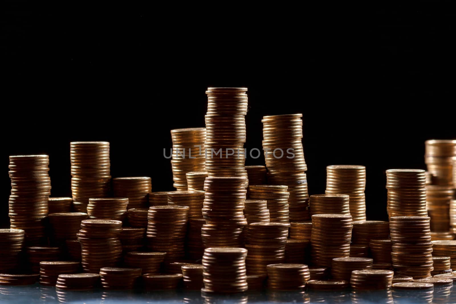 stacks of coins by mrakor