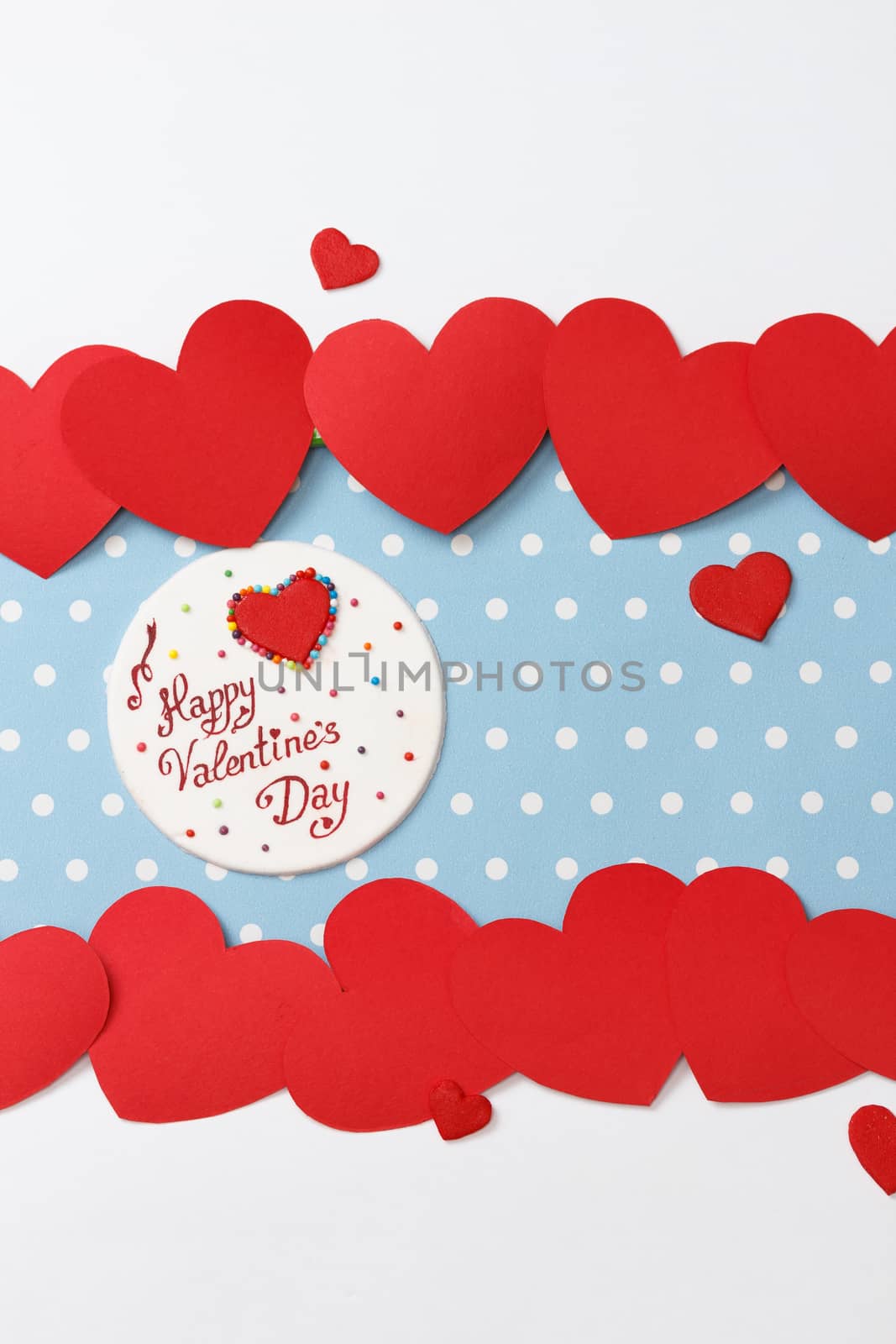 Valentine's day love message, handmade, isolated on blue with white dots background (polka dot) with white borders