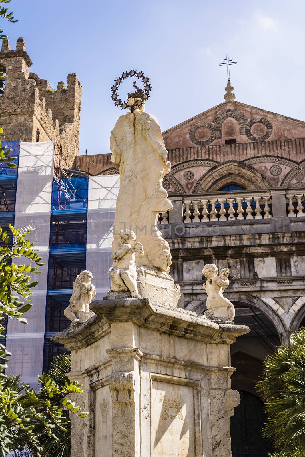 Statue in front of the historic Cathedral of Santa Maria Nuova, in the center of Monreale, Palermo, Sicily, Italy