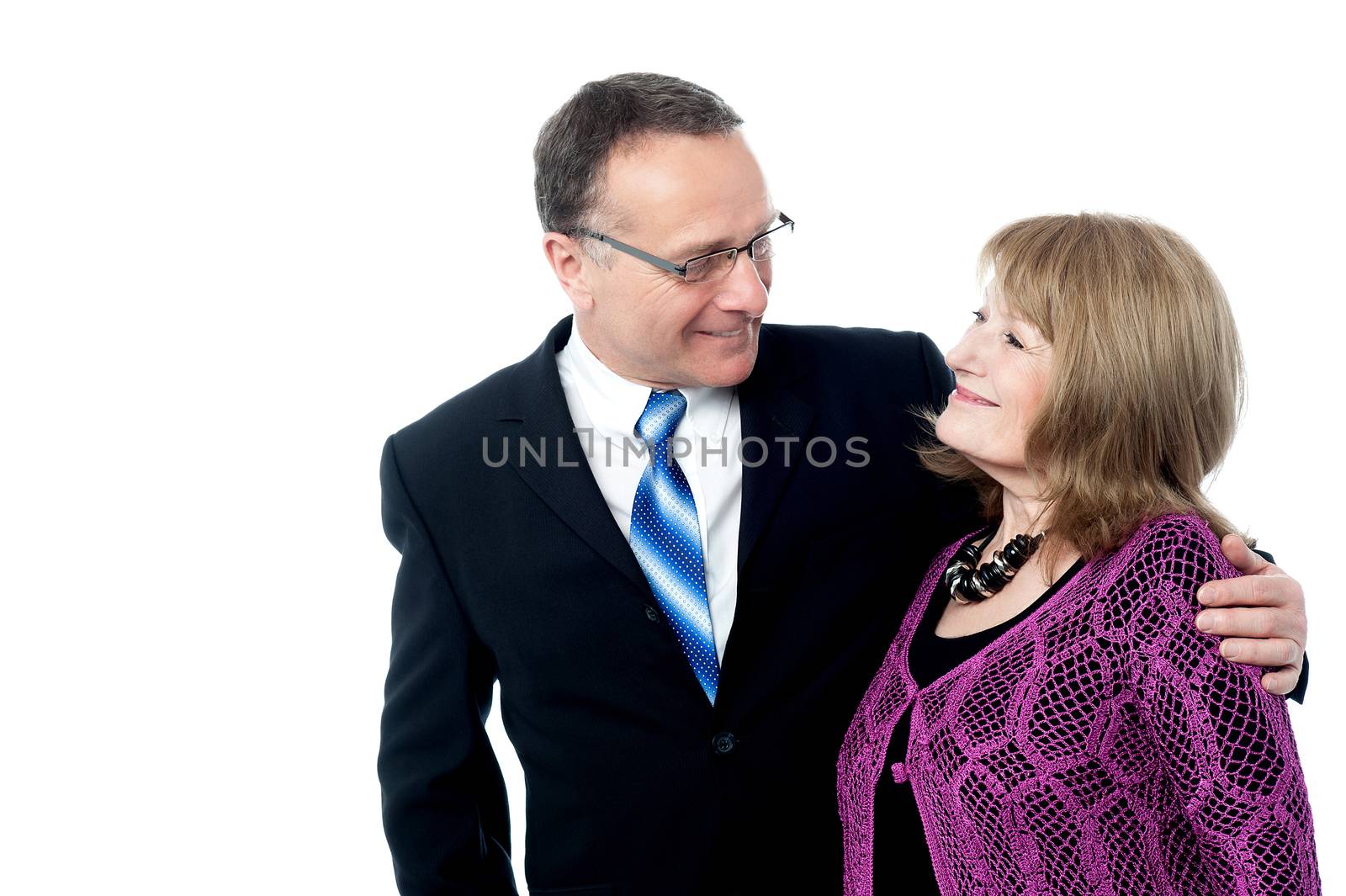 Adorable senior couple posing by stockyimages