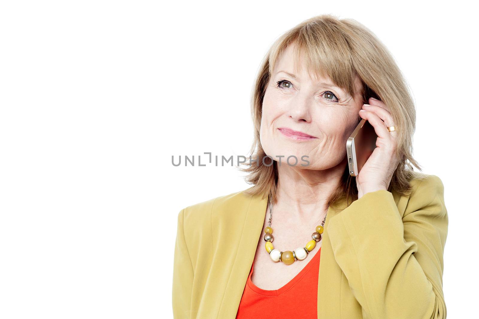 Stylish senior woman posing with cell phone