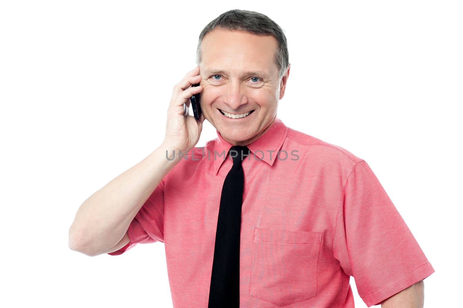 Happy aged  businessman talking on cellphone