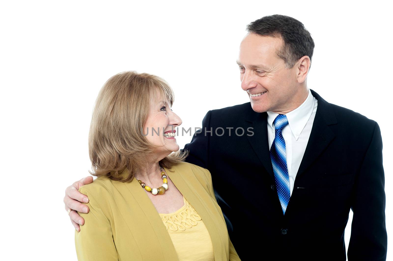 Happy seniors couple in love by stockyimages