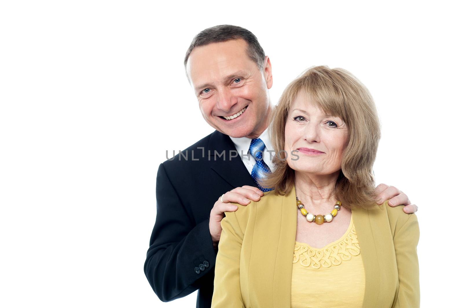 Mature business man posing behind a woman