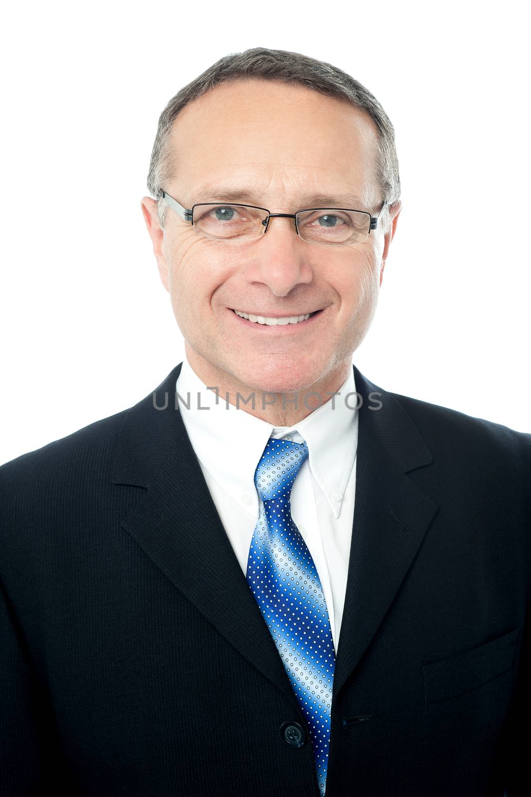 Relaxed pose of aged businessman by stockyimages