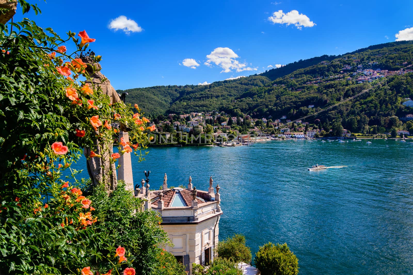 Isola Bella is located in the middle of Lake Maggiore you can get with liners or private just 5 minutes off the town of Stresa. 
The island owes its fame to the Borromeo family who built a magnificent palace with a beautiful garden.