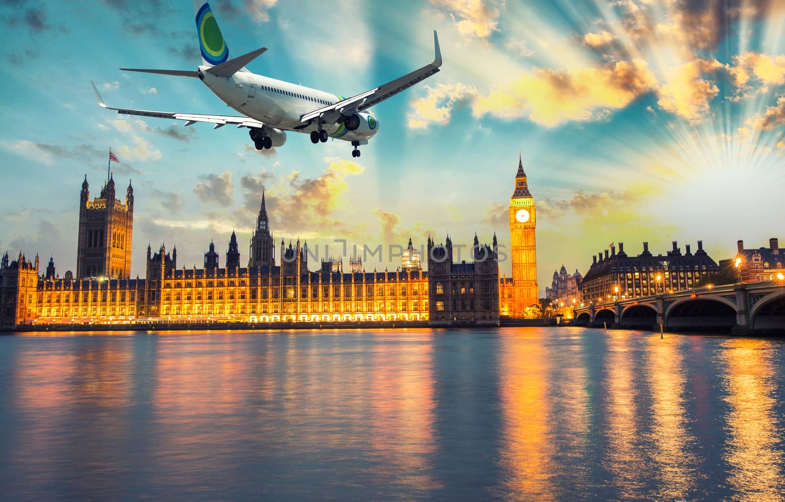 Airplane over Westminster and Big Ben, London - UK.