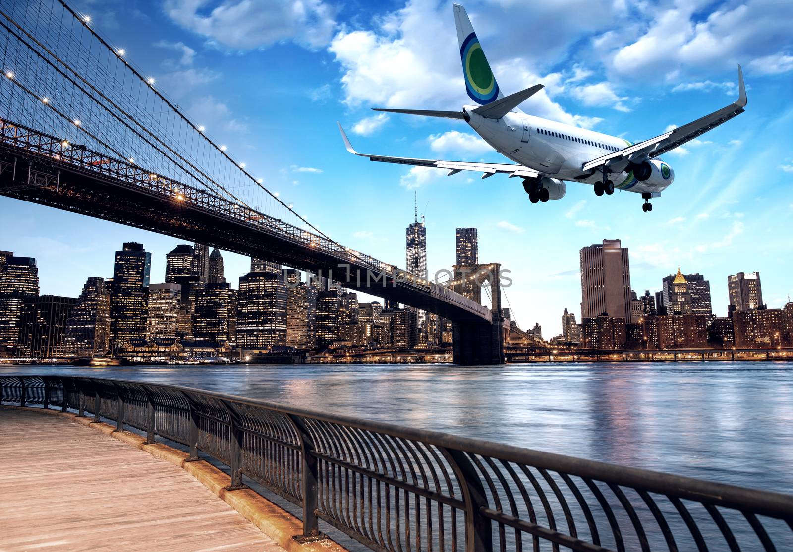 Aircraft overflying New York City skyline.