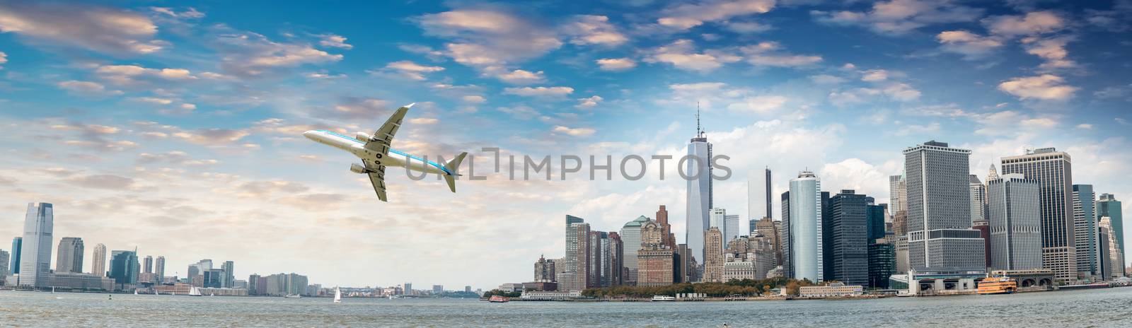Aircraft overflying New York City skyline by jovannig