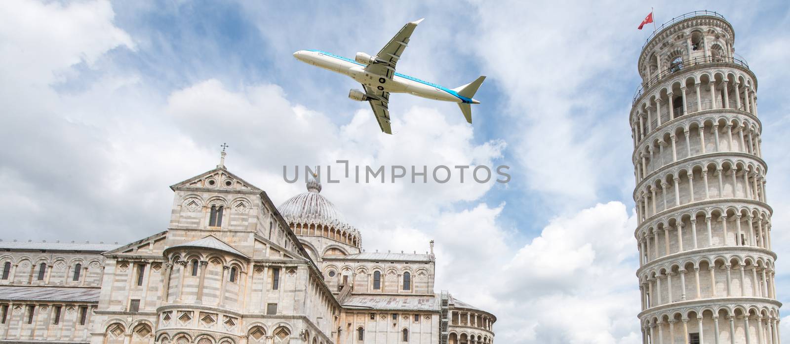Airplane over Square of Miracles in Pisa - Italy.