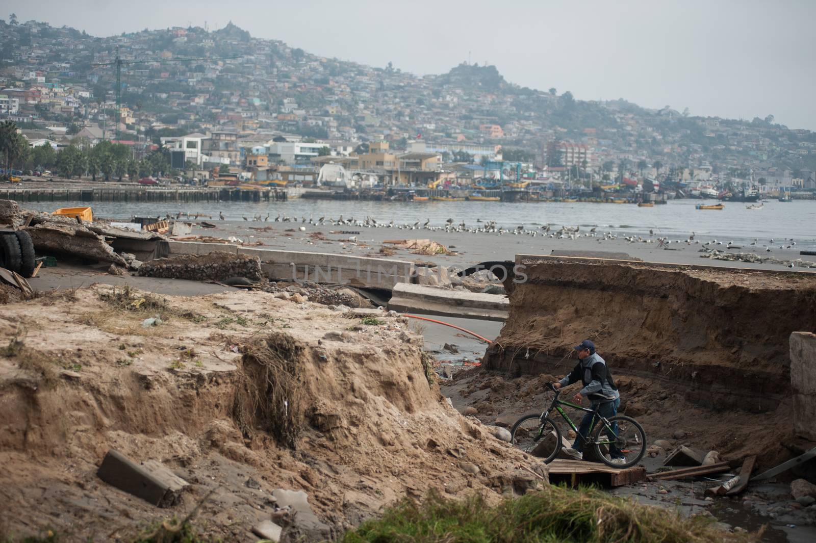 CHILE, Coquimbo: The coastal town of Coquimbo struggles to pick up the pieces on September 19, 2015 after Wednesday's 8.3 magnitude quake ripped through the region.  Residents have begun clearing up after what was the country's sixth most powerful recorded earthquake. At least 11 people have died and hundreds have been displaced since the disaster. 