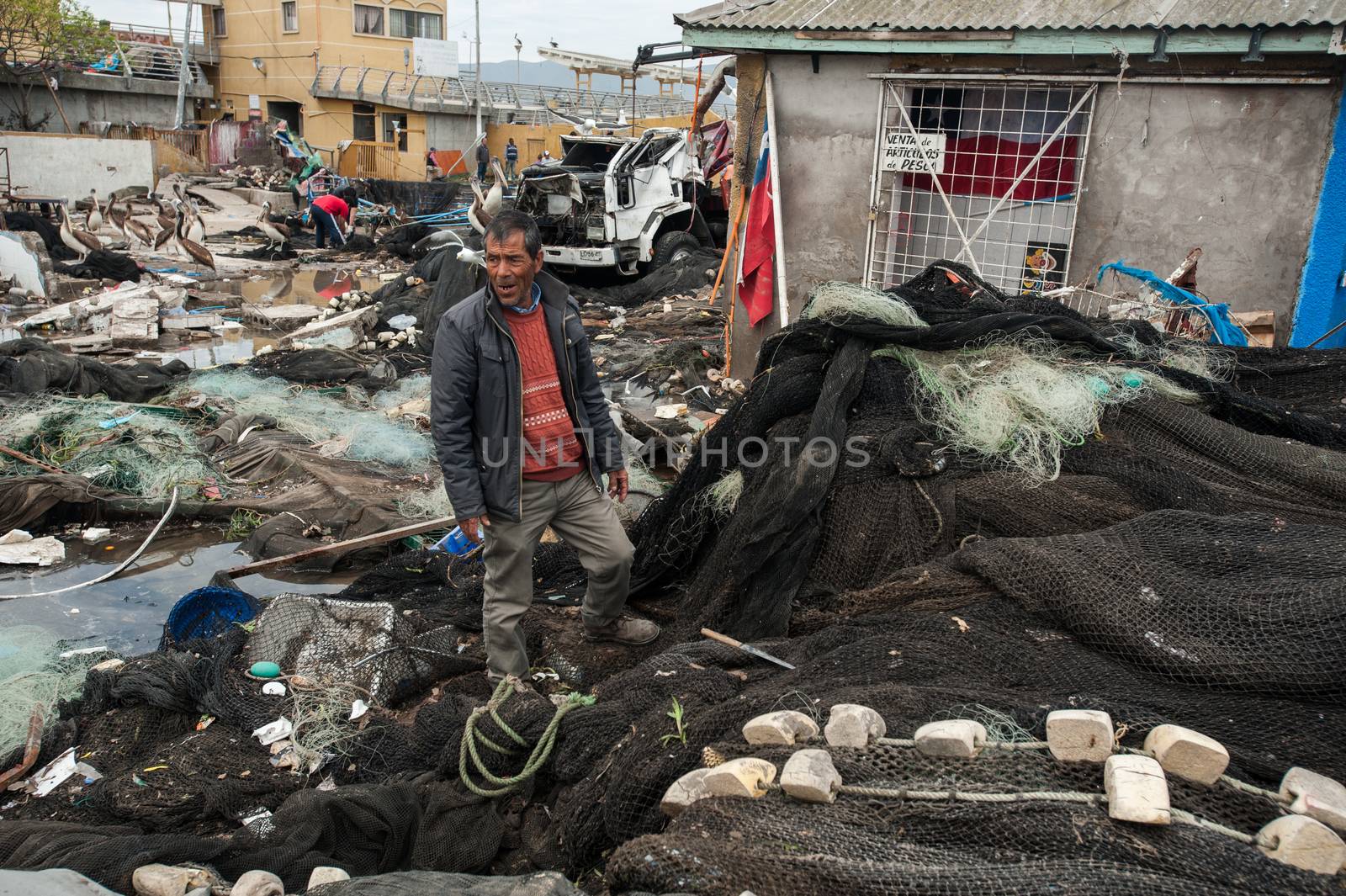 CHILE, Coquimbo: The coastal town of Coquimbo struggles to pick up the pieces on September 19, 2015 after Wednesday's 8.3 magnitude quake ripped through the region.  Residents have begun clearing up after what was the country's sixth most powerful recorded earthquake. At least 11 people have died and hundreds have been displaced since the disaster. 