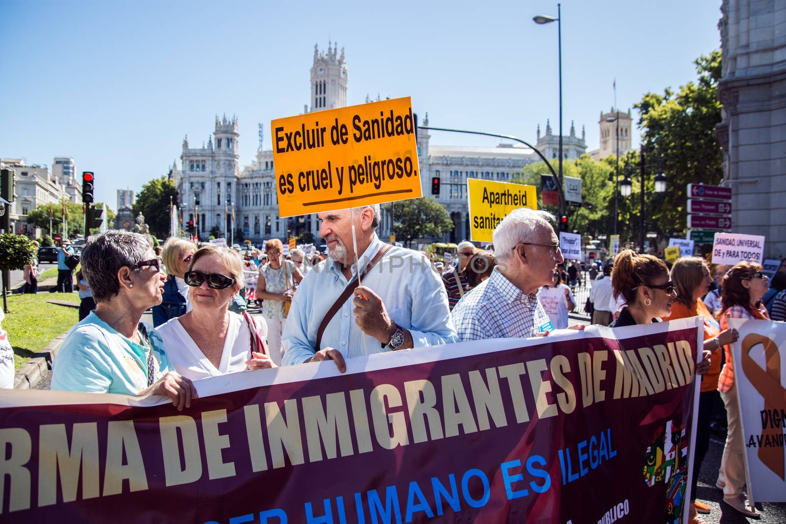 SPAIN, Madrid: Hundreds take to the streets of Madrid, Spain on September 20, 2015 as part of the White Tide movement to rally against health care privatization and budget cuts. 
