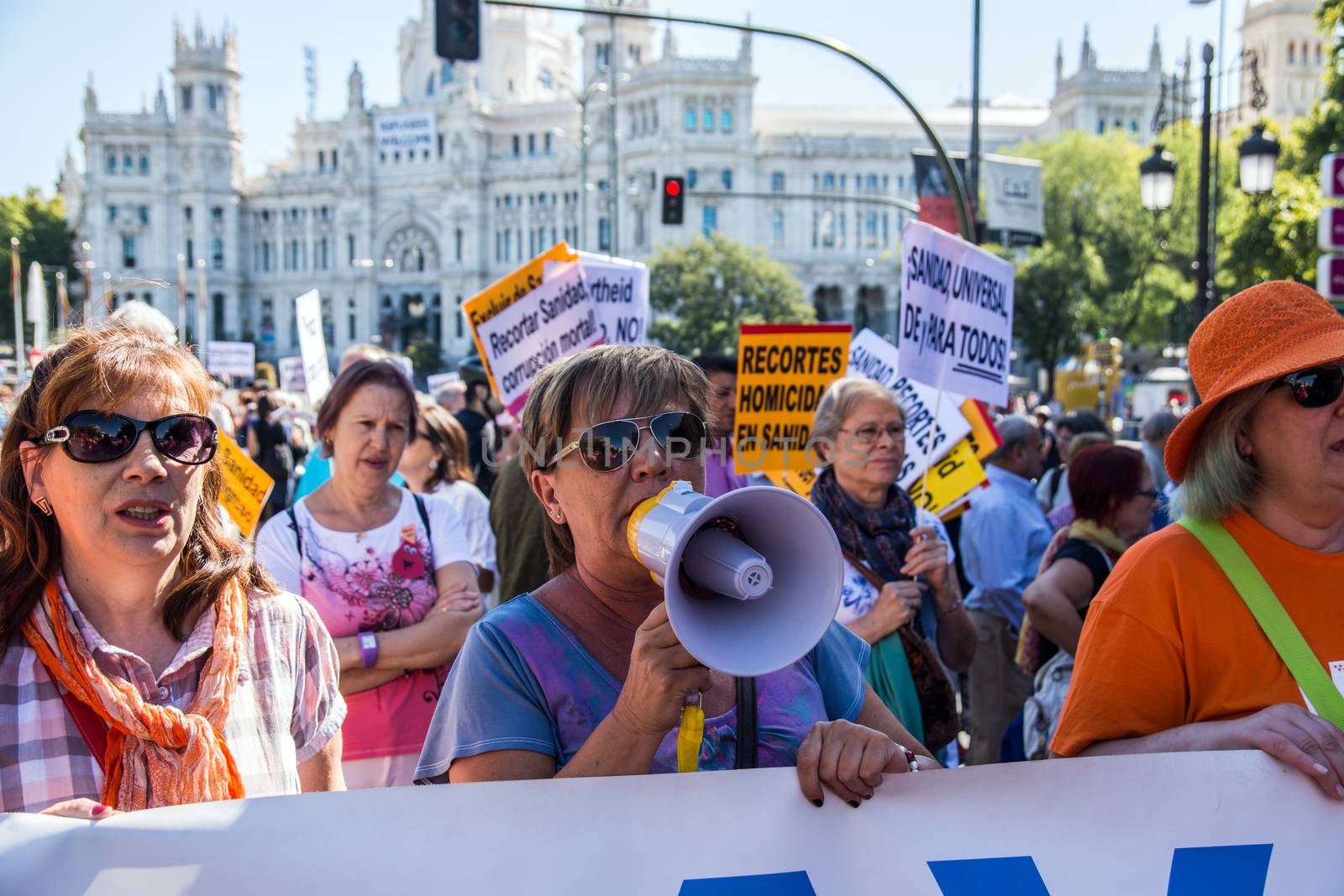 SPAIN, Madrid: Hundreds take to the streets of Madrid, Spain on September 20, 2015 as part of the White Tide movement to rally against health care privatization and budget cuts. 