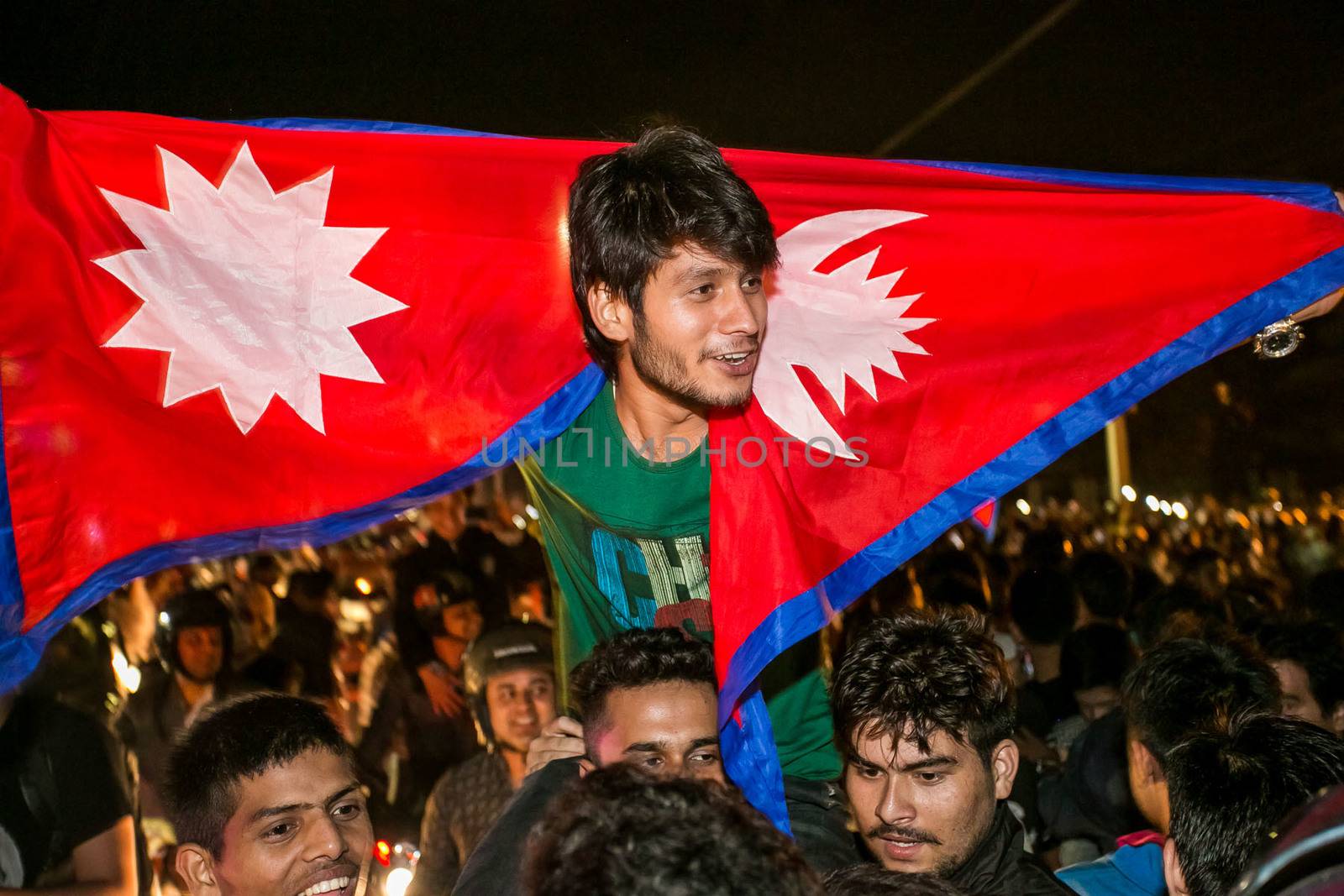 NEPAL, Kathmandu: After years of debate, Nepal adopted a new constitution on September 20, 2015, prompting scores of residents to celebrate near the constituent assembly building in Kathmandu. Out of the 598 members of the Constituent Assembly, 507 voted for the new constitution, 25 voted against, and 66 abstained in a vote on September 16, 2015. The event was marked with fireworks and festivities, but also with protests organized by parties of the Tharu and Madhesi ethnic communities.