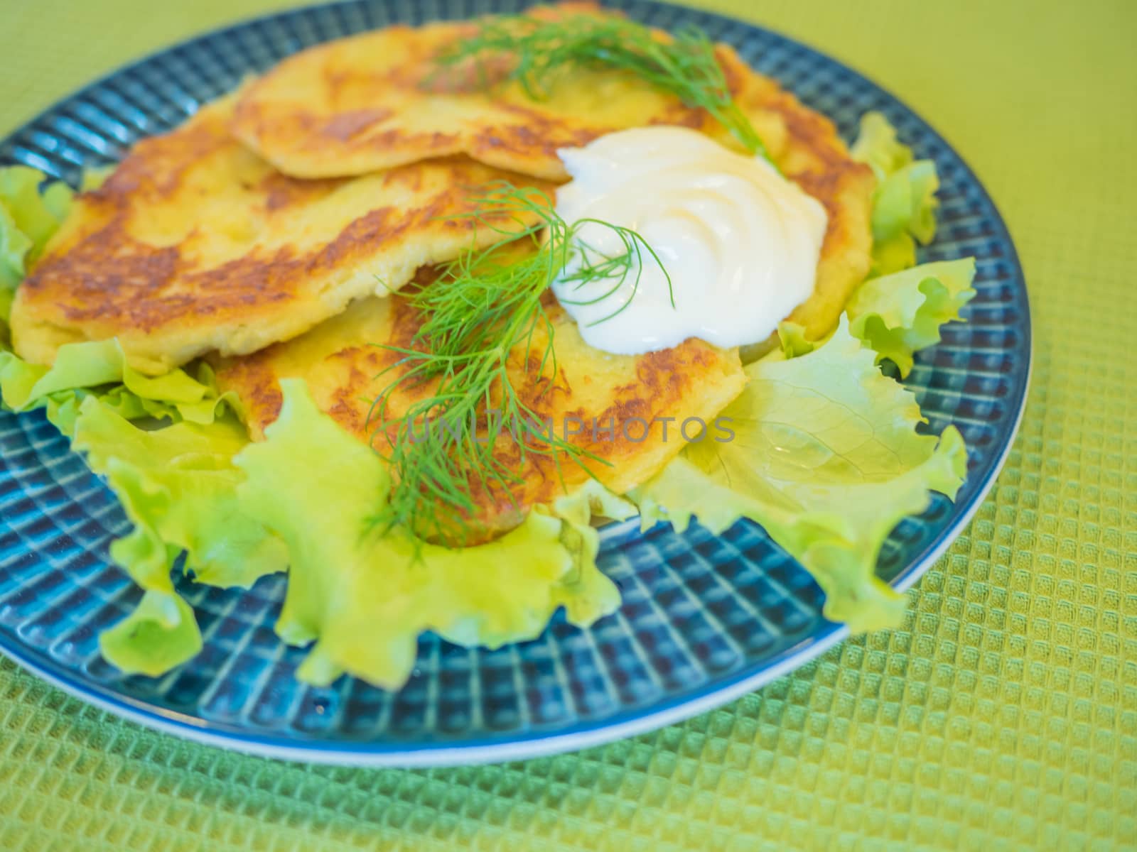 potato pankakes with cream frache and dill - draniki